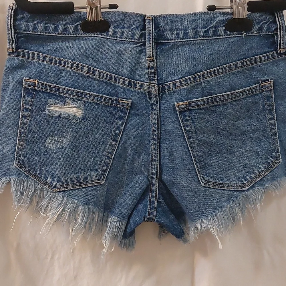Free People, We the free. Mid Indigo Frayed hem distress shorts. W25 - Picture 4 of 5